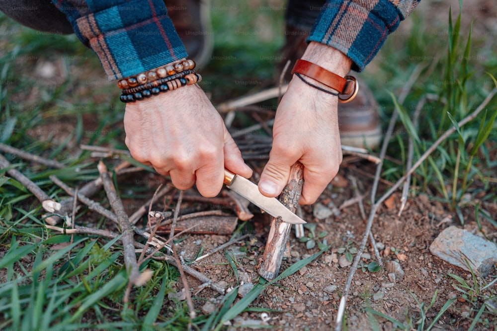 a person is holding a knife in their hand