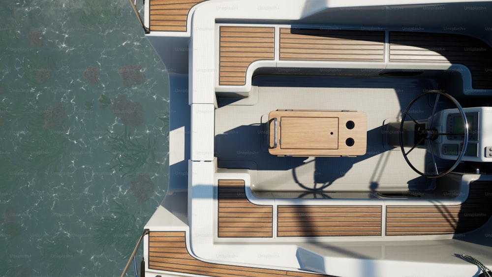 an overhead view of a boat with a steering wheel