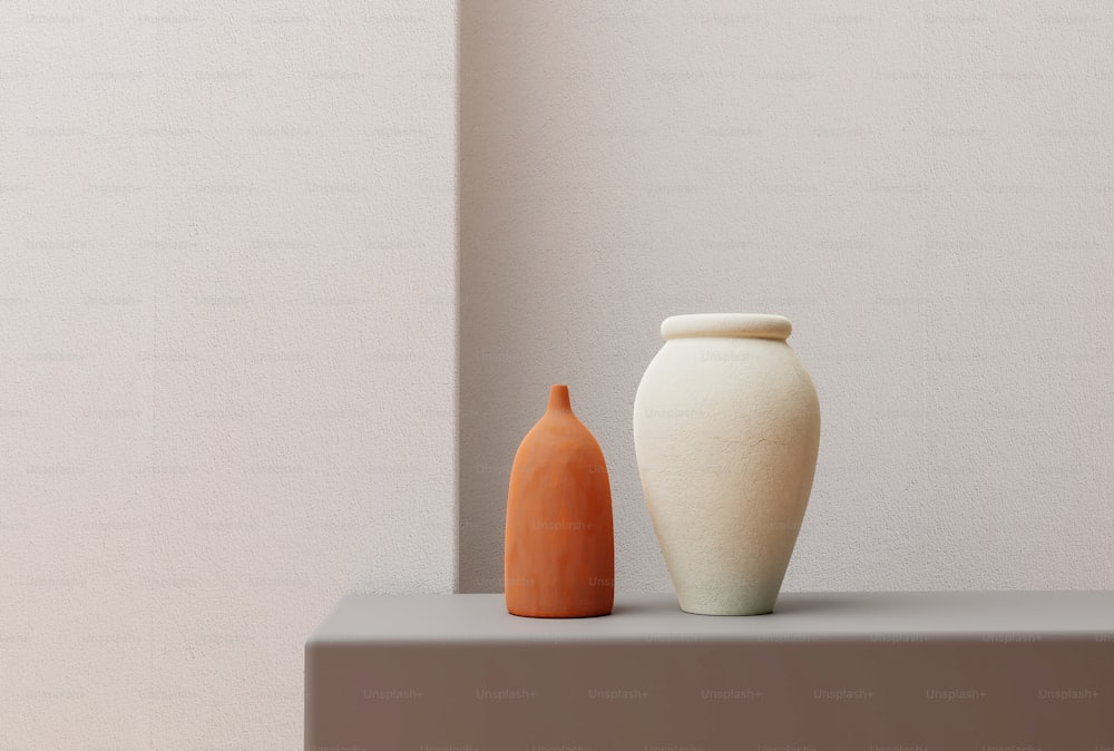 a couple of vases sitting on top of a shelf