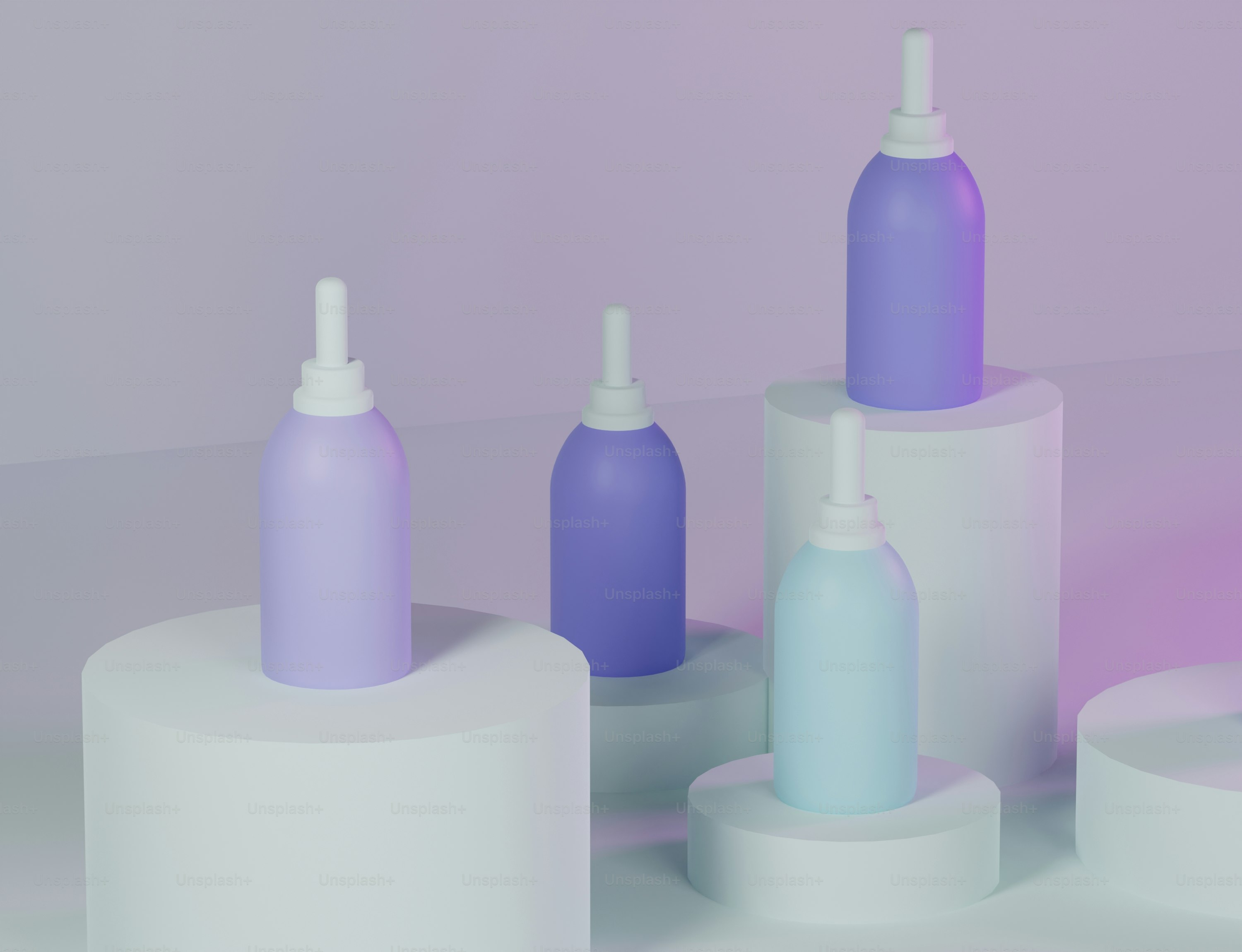 A group of different colored bottles sitting on top of each other photo ...