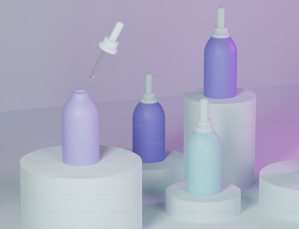 a purple and blue bottle with a dropper on top of it