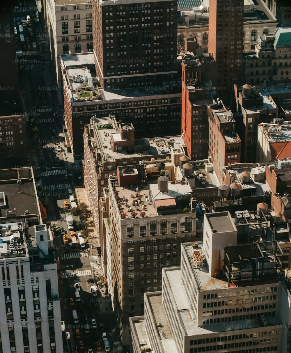 an aerial view of a city with tall buildings