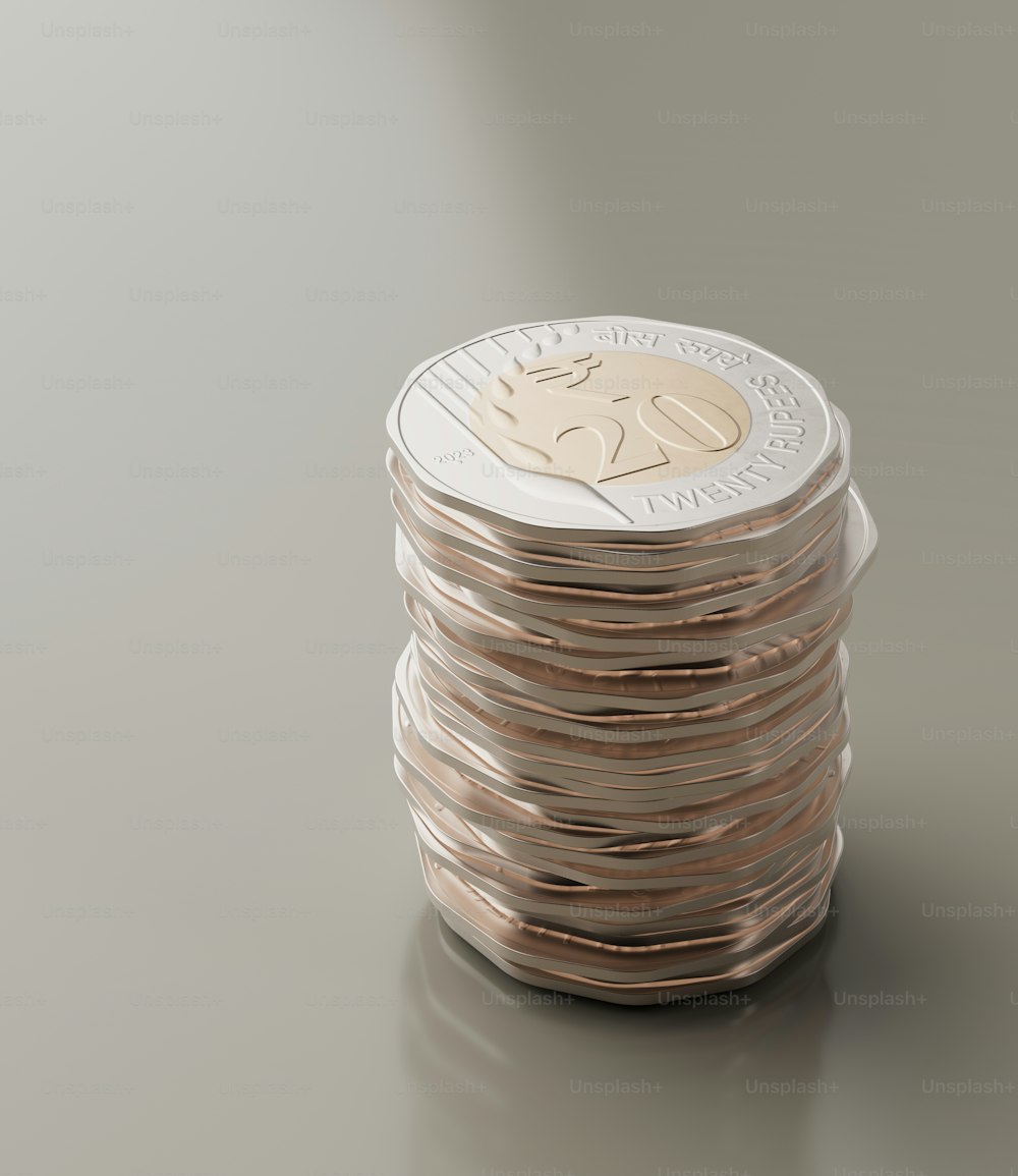 a stack of coins sitting on top of a table