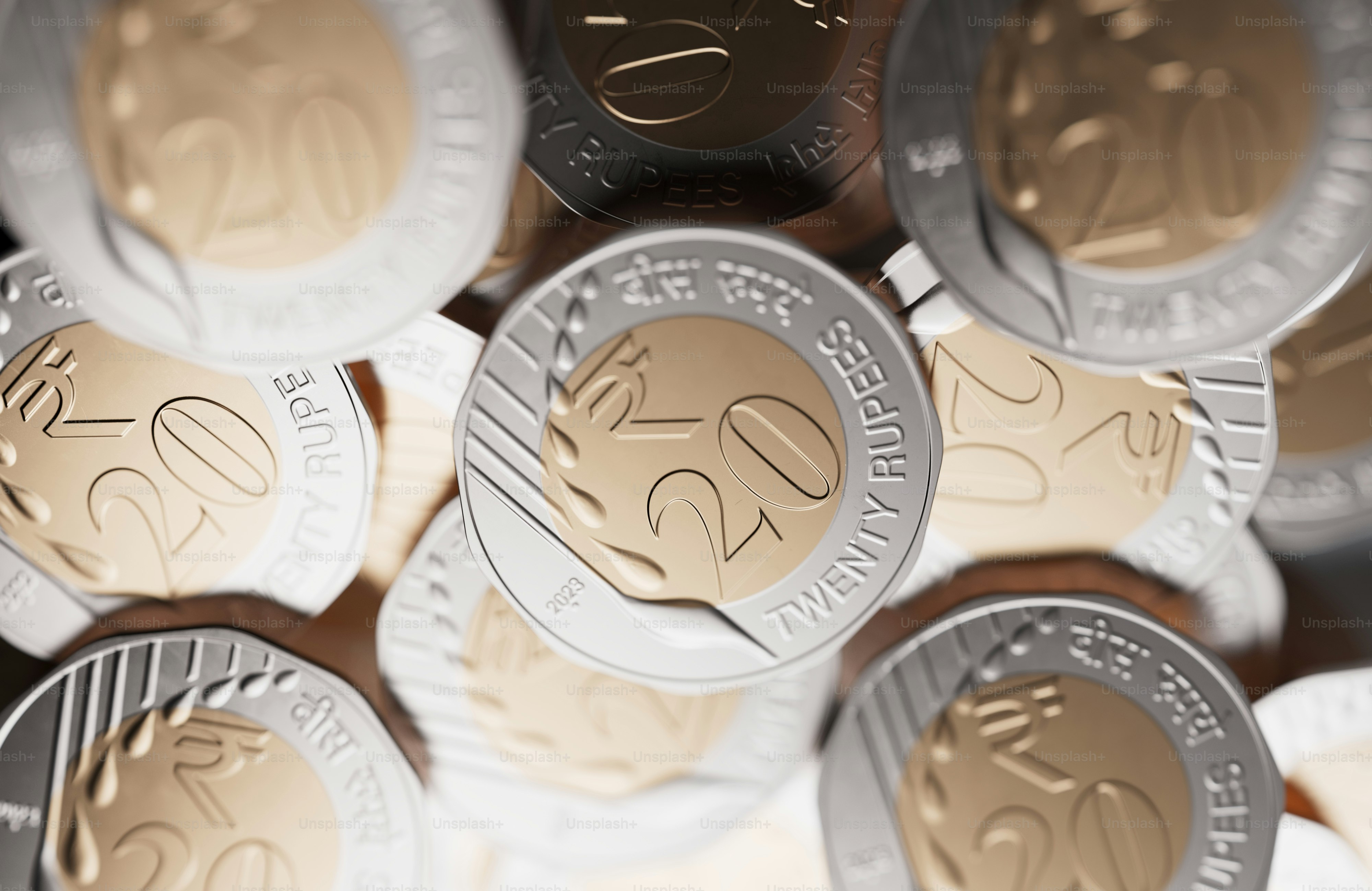 a close up of a pile of coins