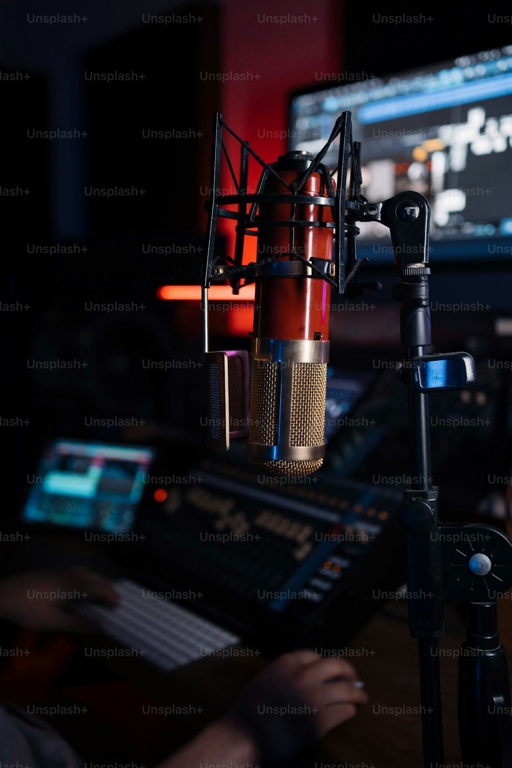 a microphone in front of a computer screen