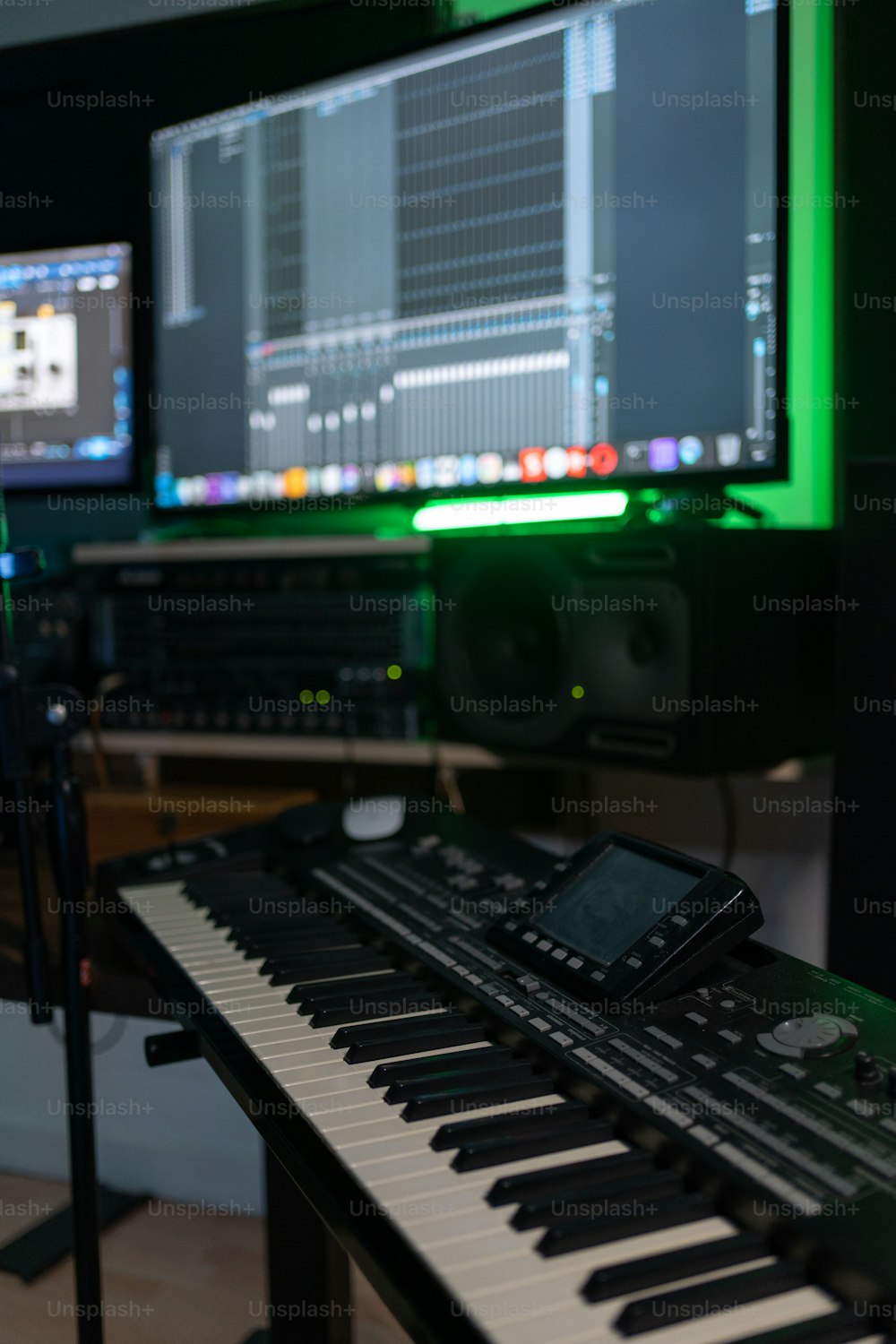 a keyboard and a monitor in a room