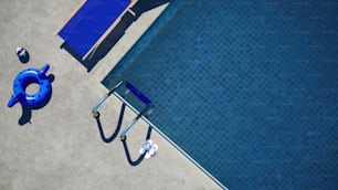an overhead view of a blue swimming pool