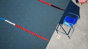 a blue chair sitting next to a red and white line