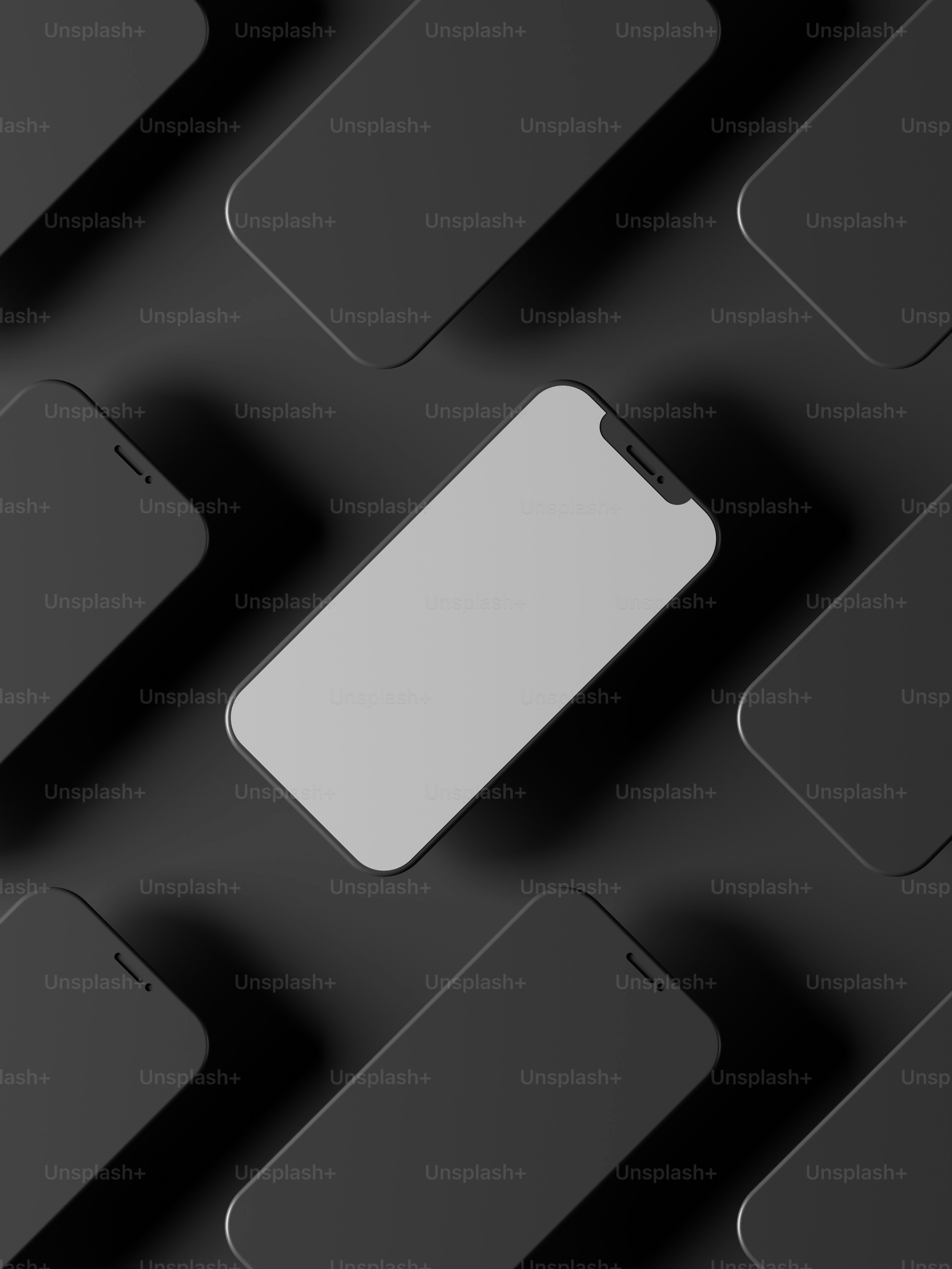 a close up of a cell phone on a keyboard