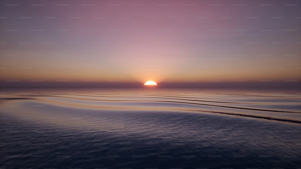 태양이 바다의 수평선 너머로 지고 있다