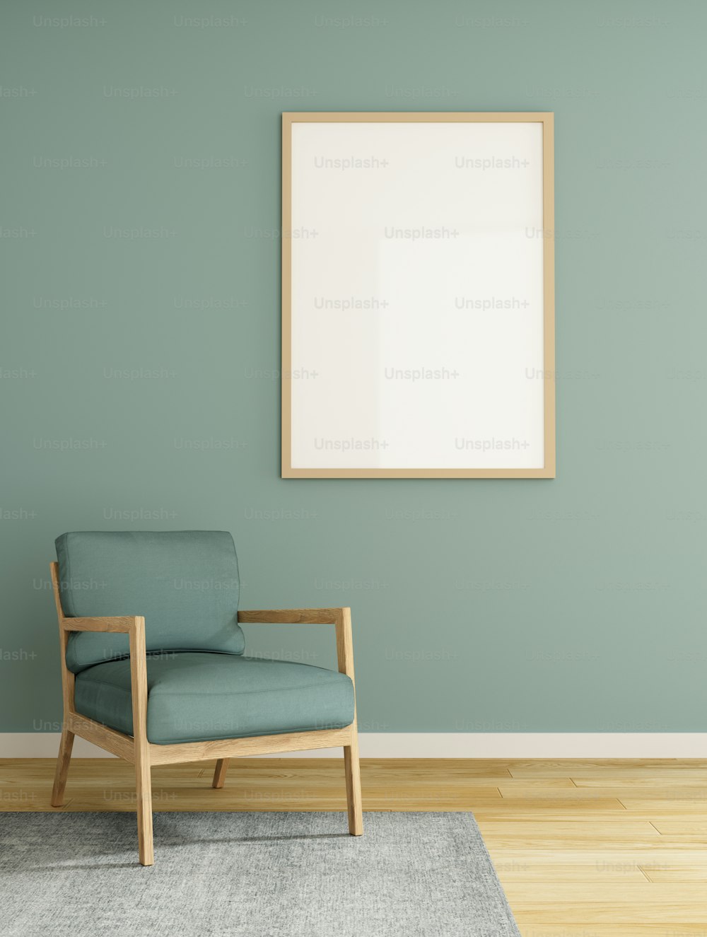 a chair in a room with a picture frame on the wall