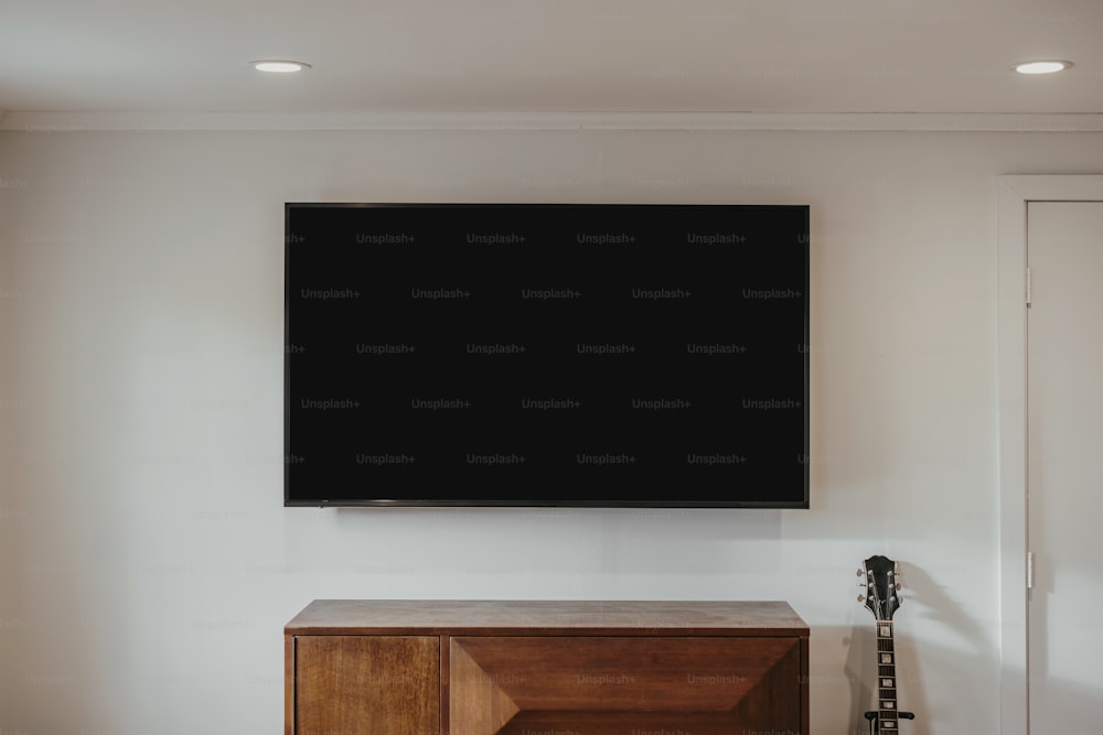 a flat screen tv mounted on a wall