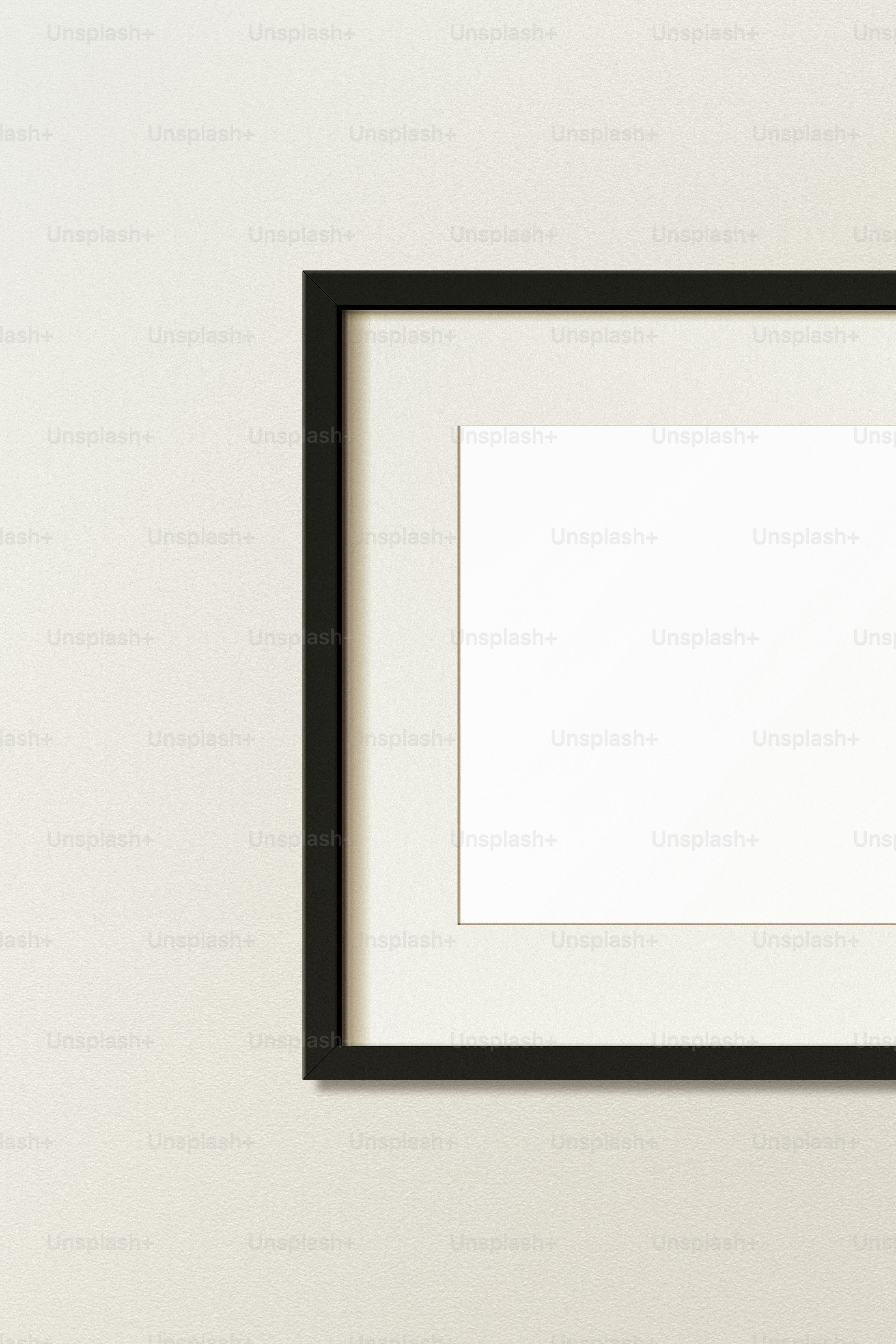 a black framed picture hanging on a wall