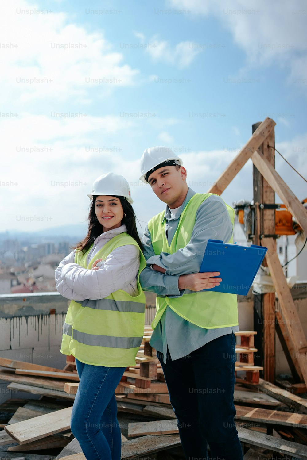 a man and a woman standing on a construction site