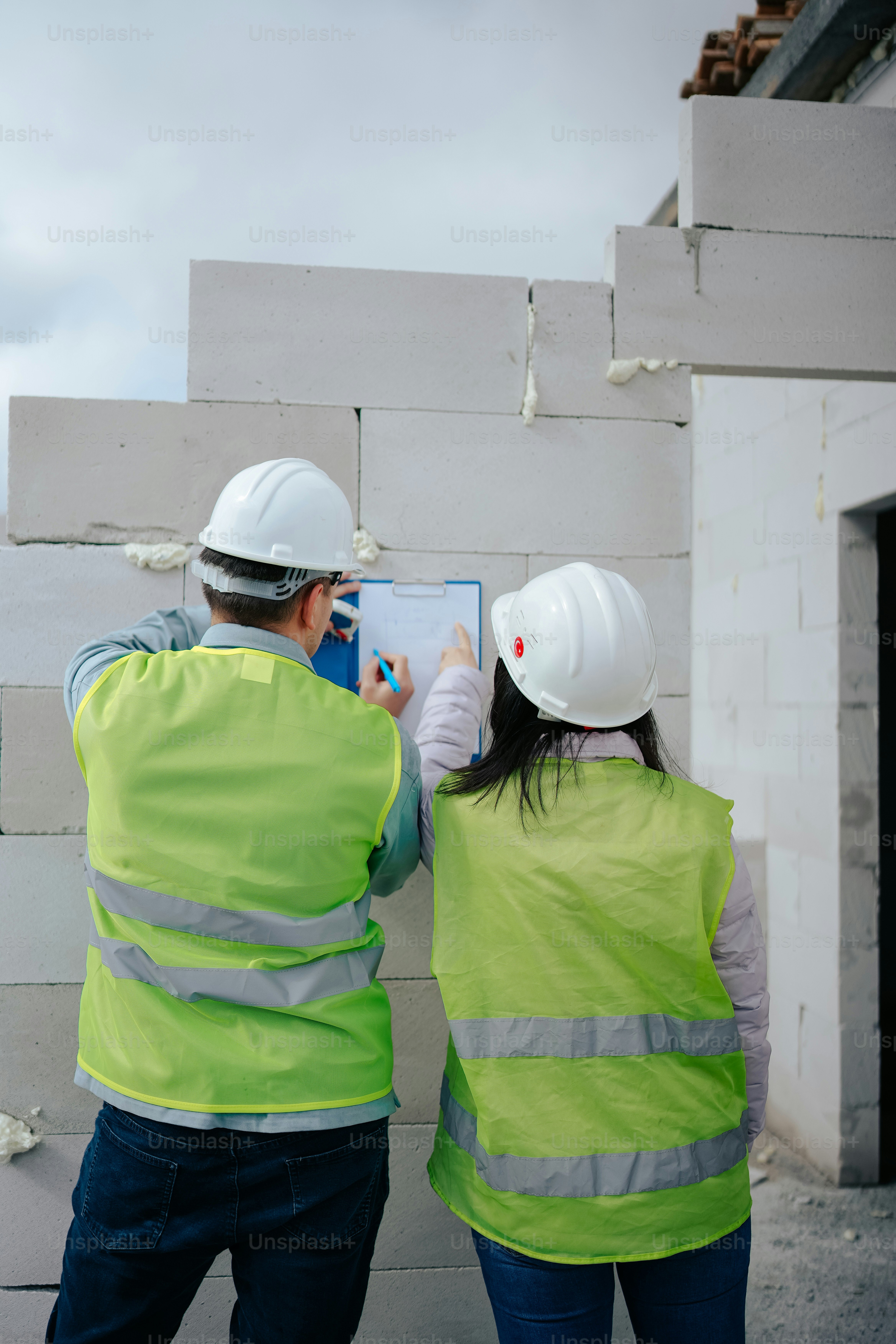 a couple of people standing next to each other