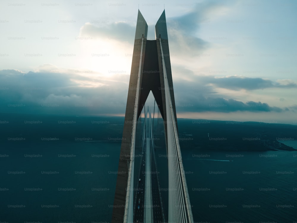 a very tall bridge over a large body of water