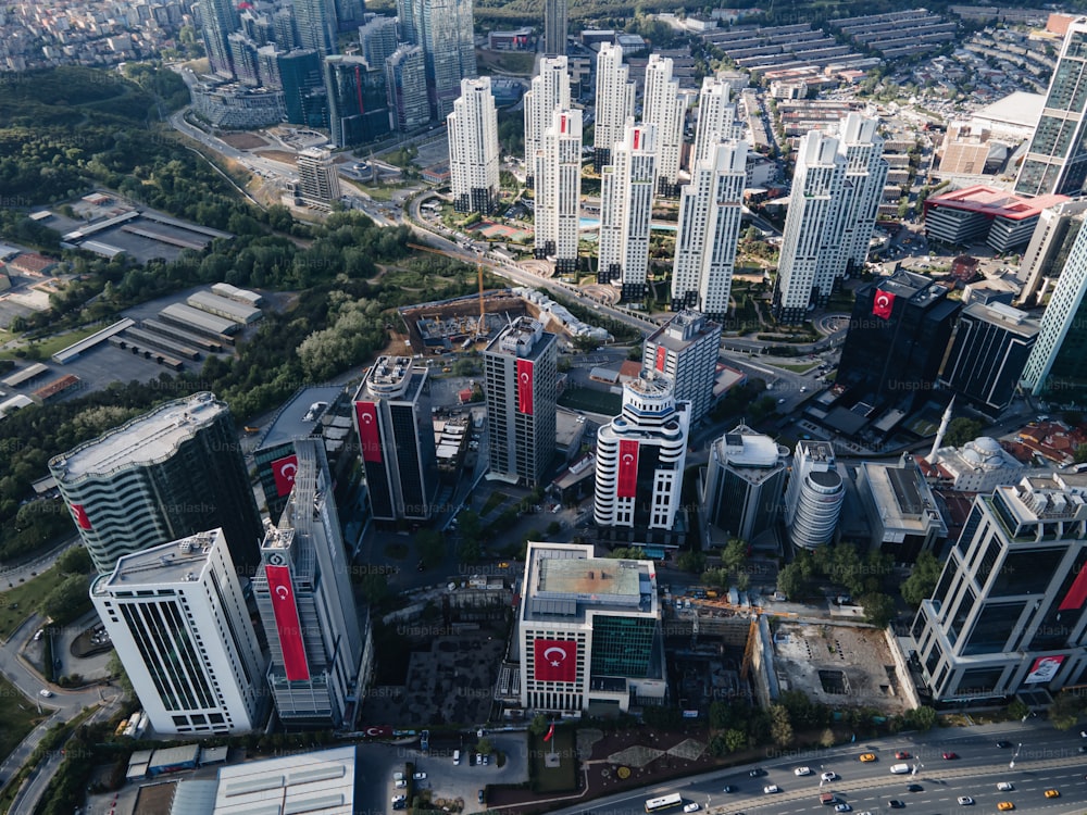 an aerial view of a city with tall buildings