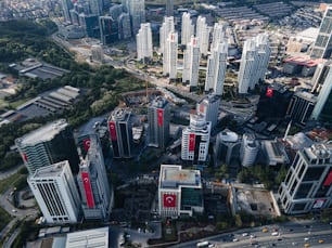 an aerial view of a city with tall buildings