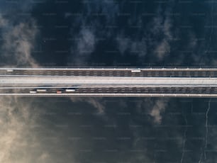 an aerial view of a train on a track