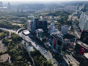 an aerial view of a city with tall buildings