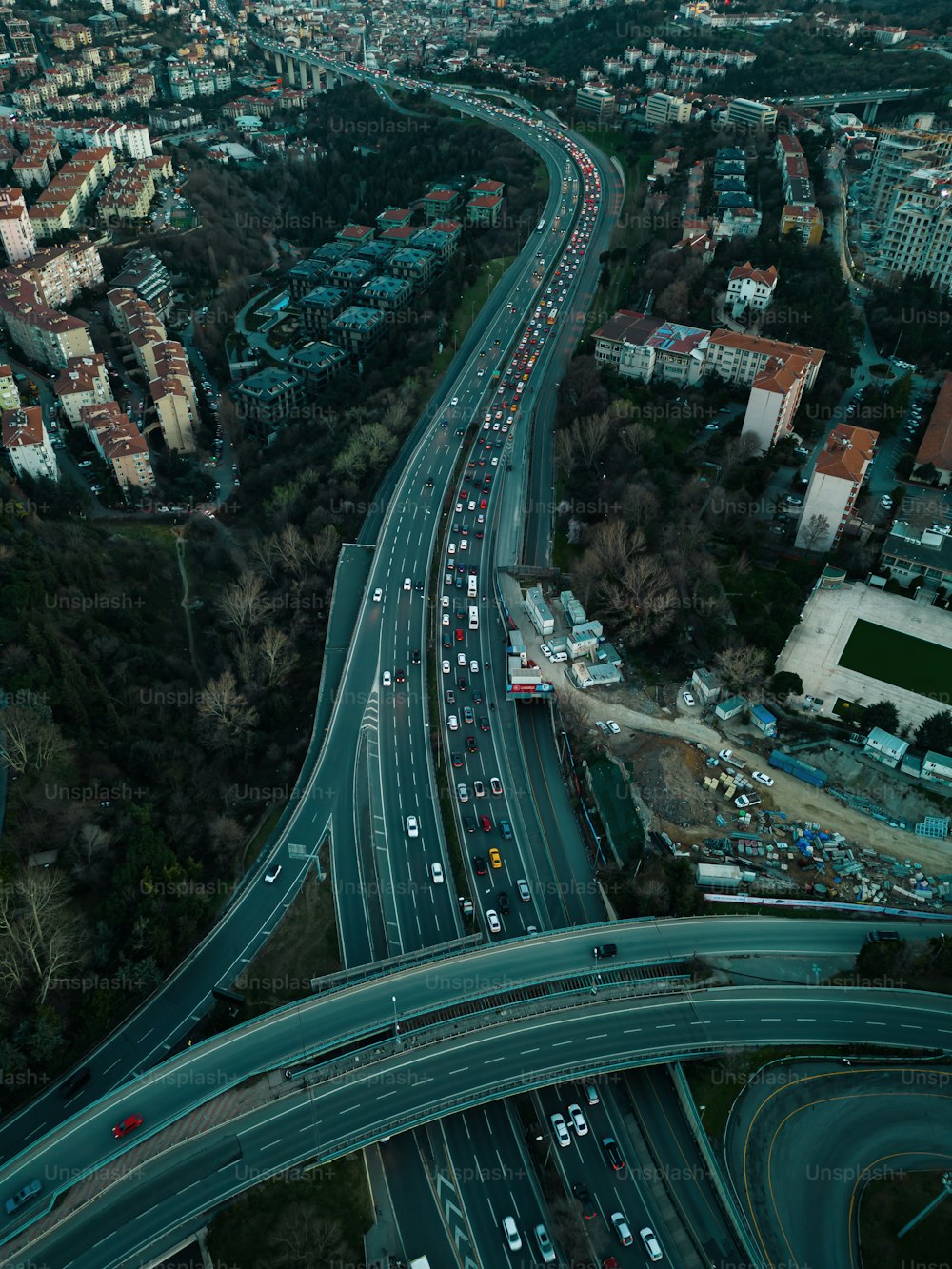 an aerial view of a highway with a lot of traffic