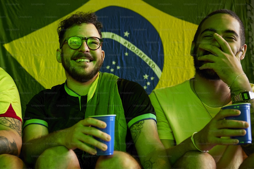 a group of men sitting next to each other