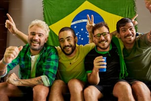 a group of men sitting next to each other