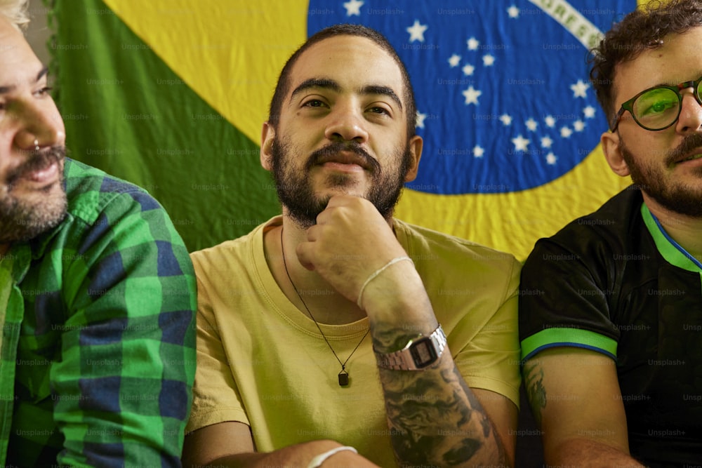 a group of men sitting next to each other