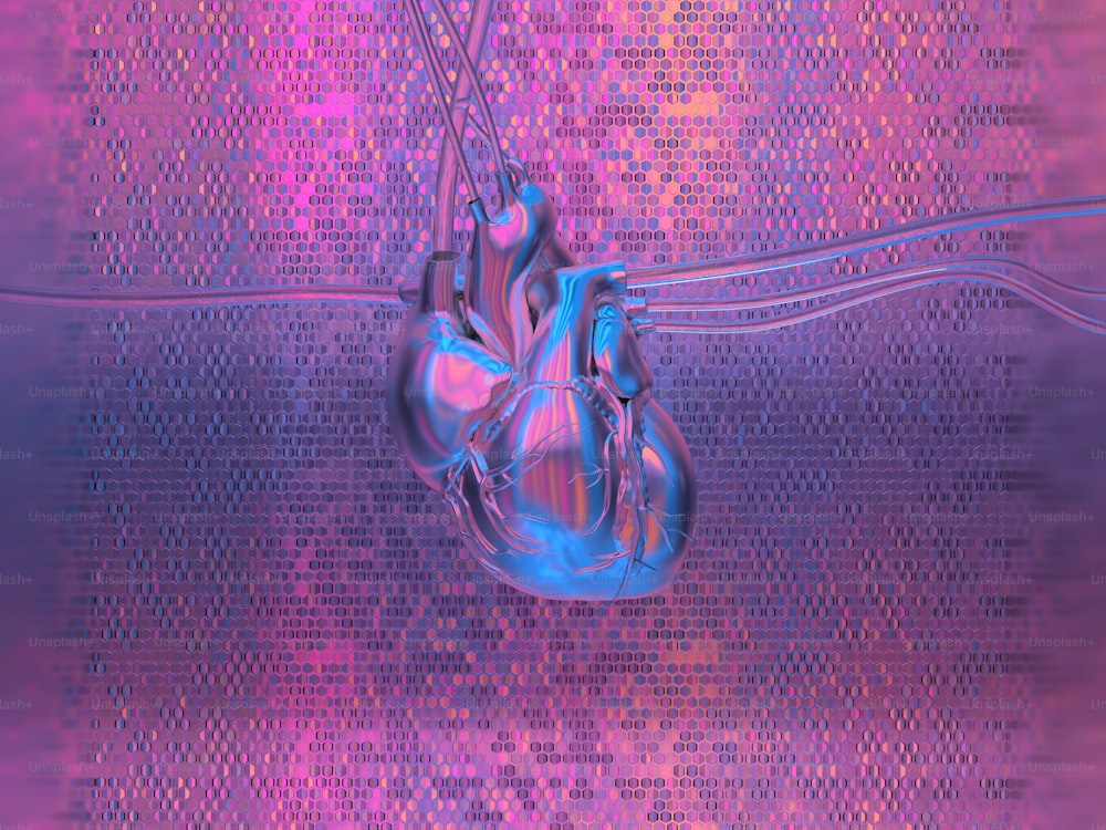 a blue and pink heart hanging from a string