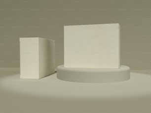 una scatola bianca e una scatola bianca su una superficie bianca