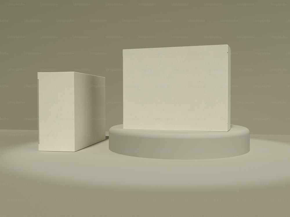 una caja blanca y una caja blanca sobre una superficie blanca
