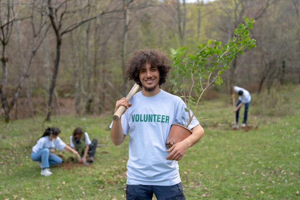 a man holding a baseball bat in a field