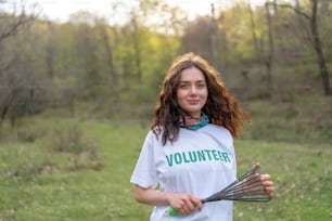 a woman holding a pair of scissors in her hands