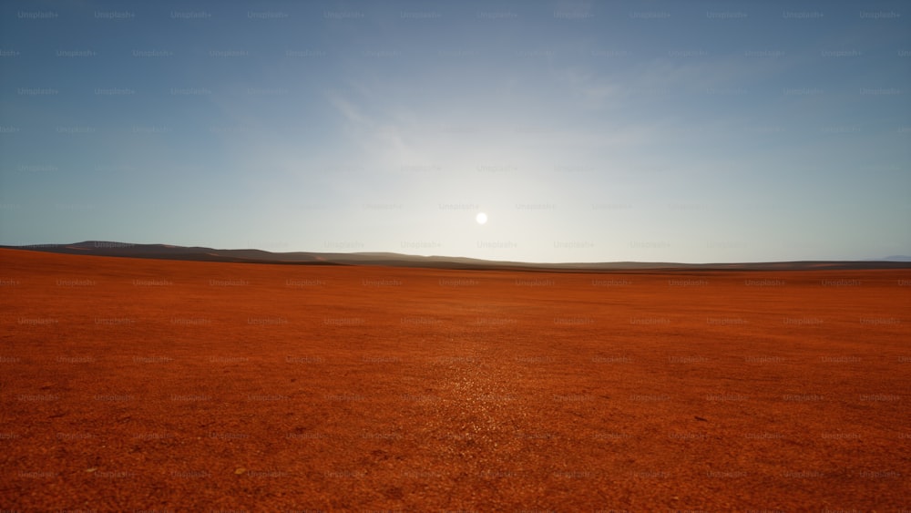 Le soleil se couche sur une plaine aride