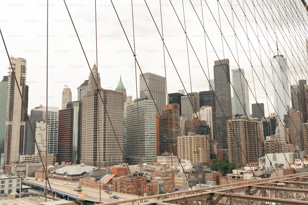 a view of a city from the top of a bridge