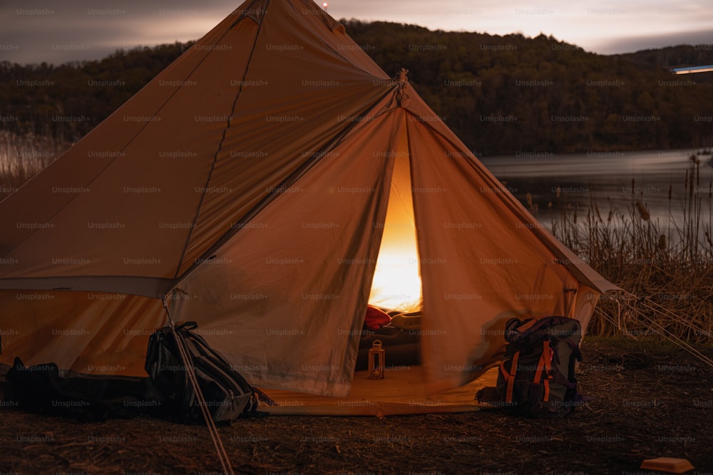 a tent with a fire burning inside of it
