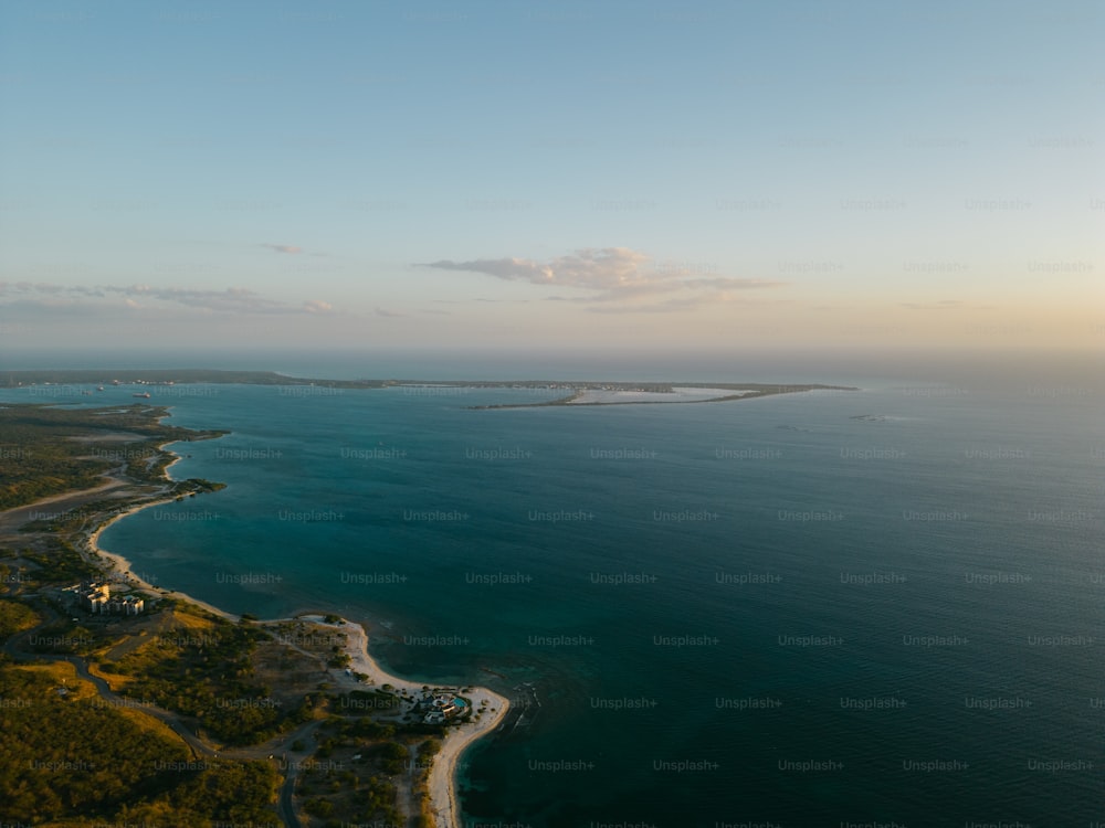 a bird's eye view of a beach and a body of water