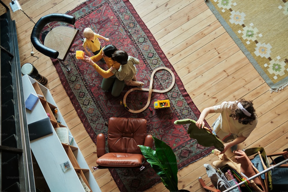 a woman sitting on a chair in a living room