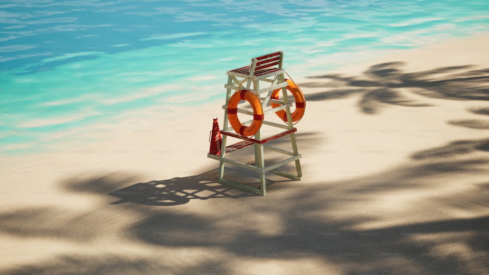 a life preserver sitting on a beach next to a body of water