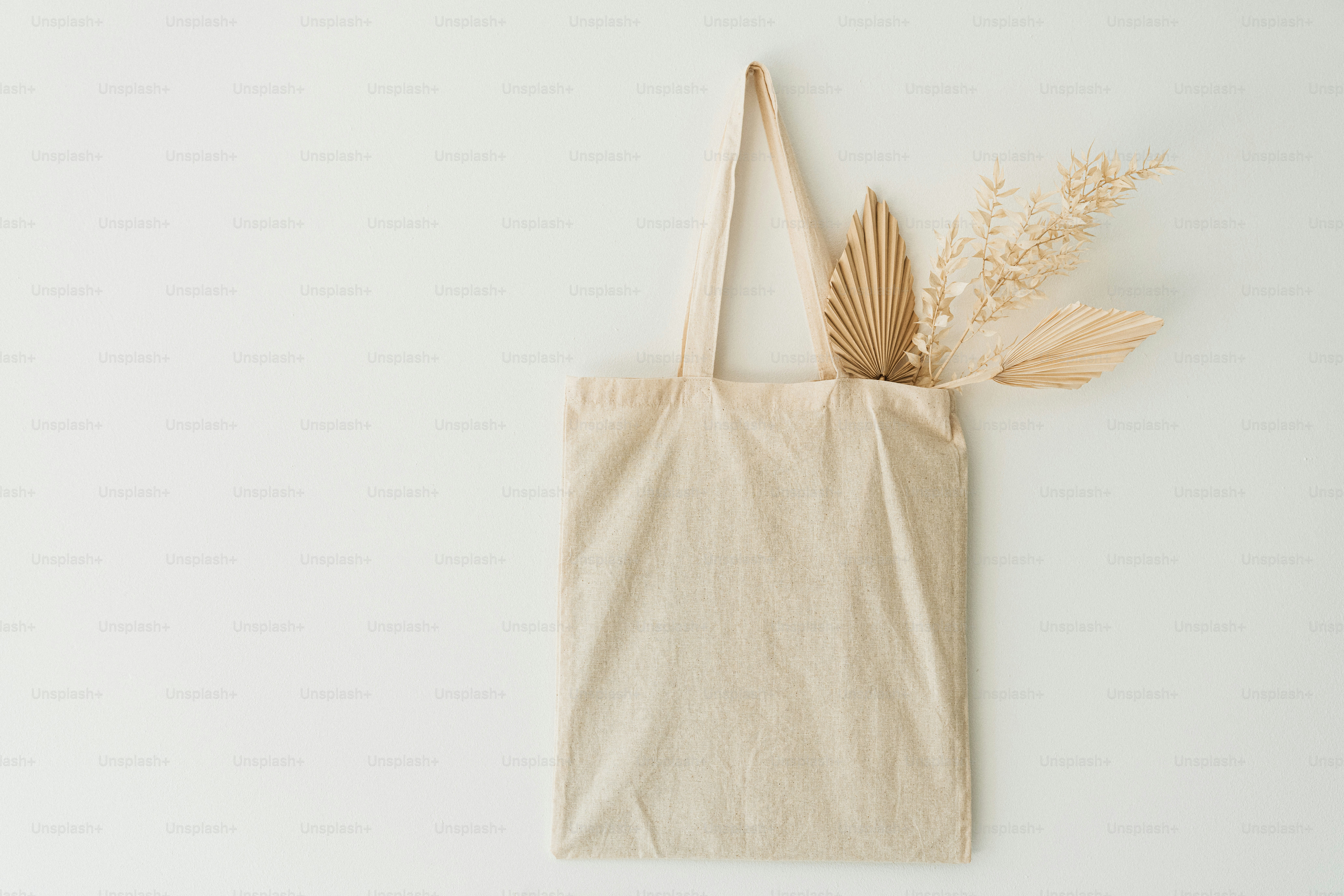 a bag with a plant sticking out of it