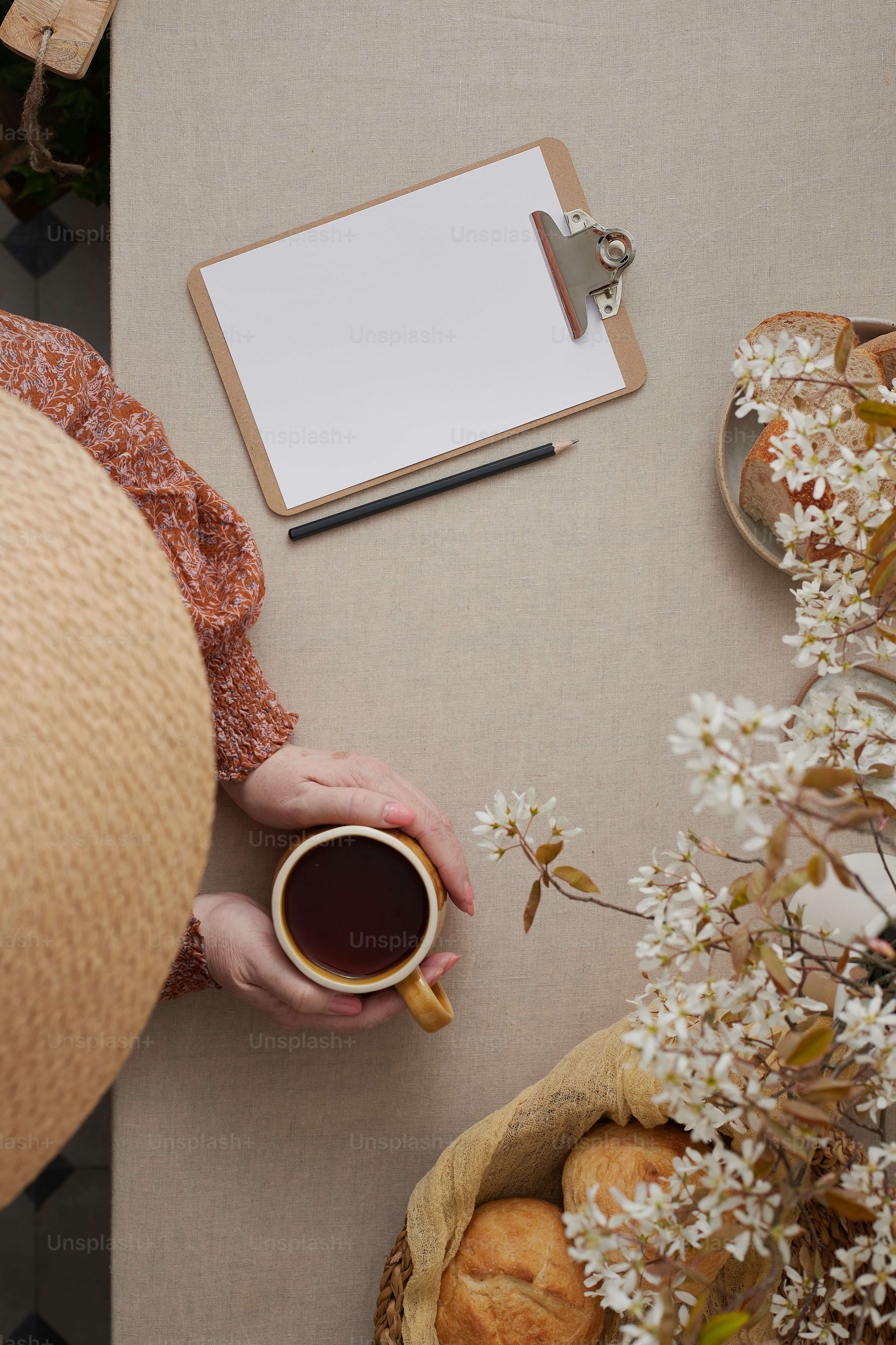a person is holding a cup of coffee