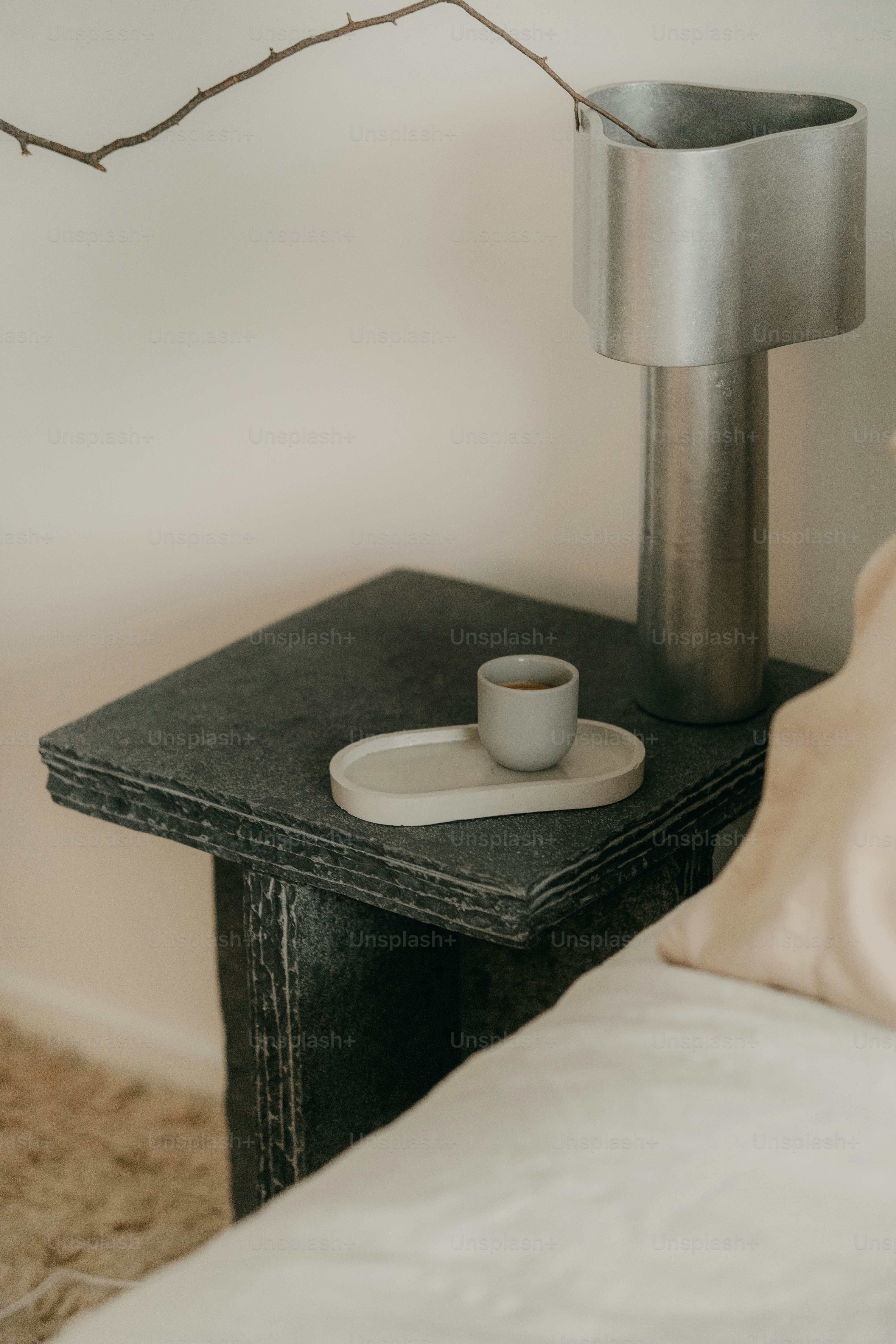 a table with a cup and saucer on it