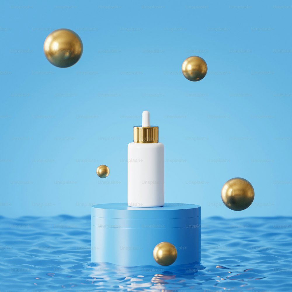 a bottle with a gold cap is floating in the water
