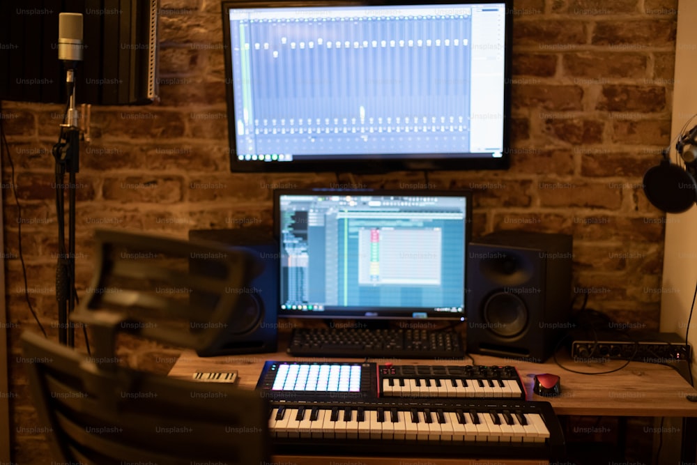 a desk with a keyboard and a monitor