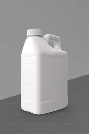 a gallon of white liquid sitting on top of a table