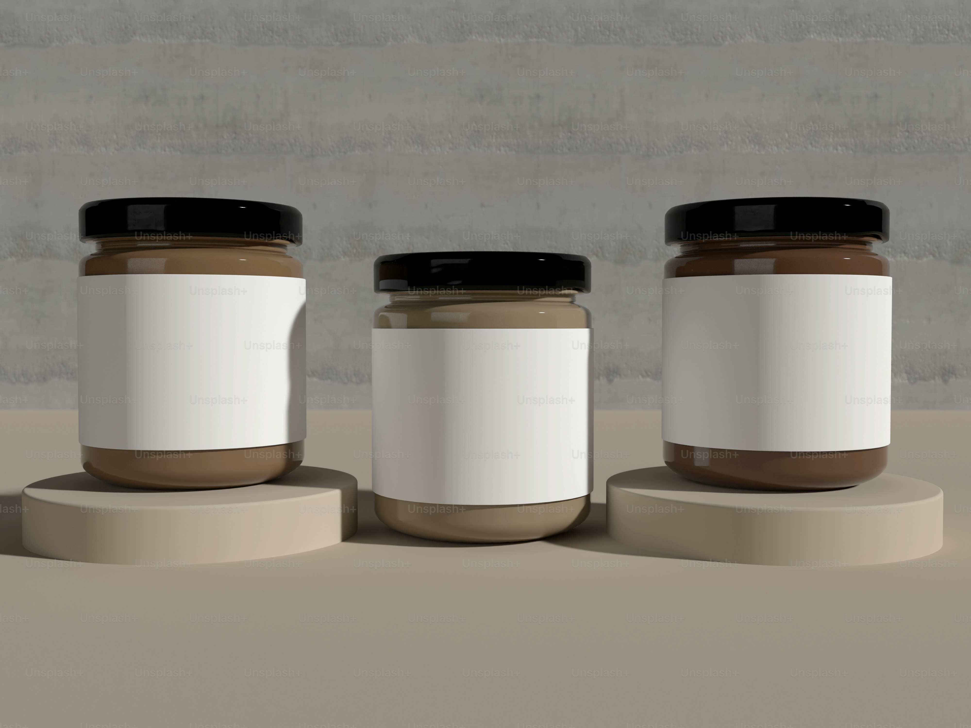three jars of peanut butter on a table