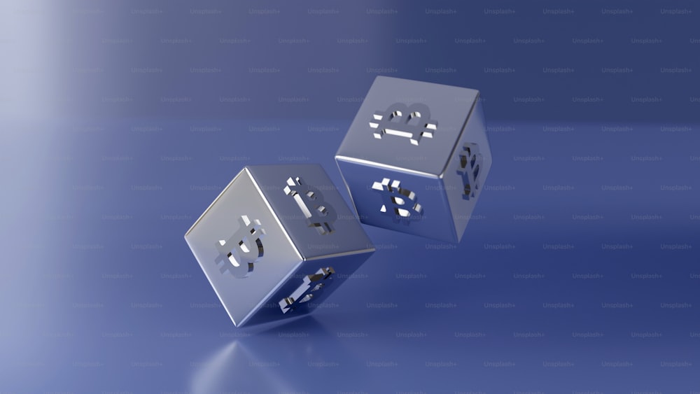 a pair of dices sitting on top of a table