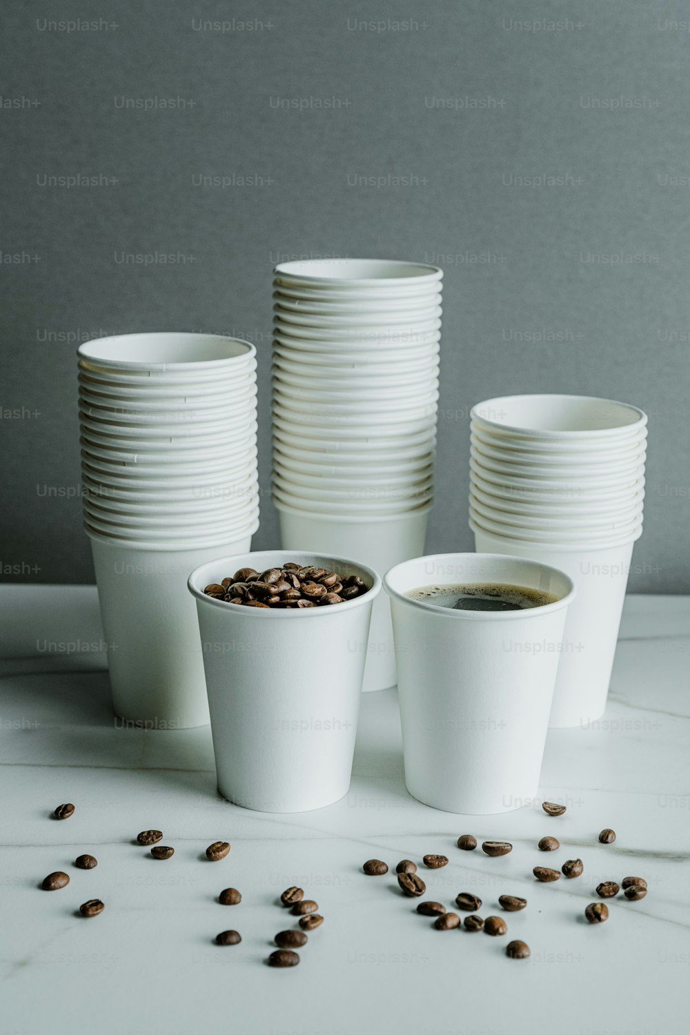 a bunch of cups that are sitting on a table