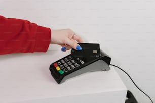 a woman is pressing buttons on a phone