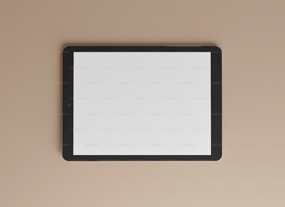 a black square mirror on a wall